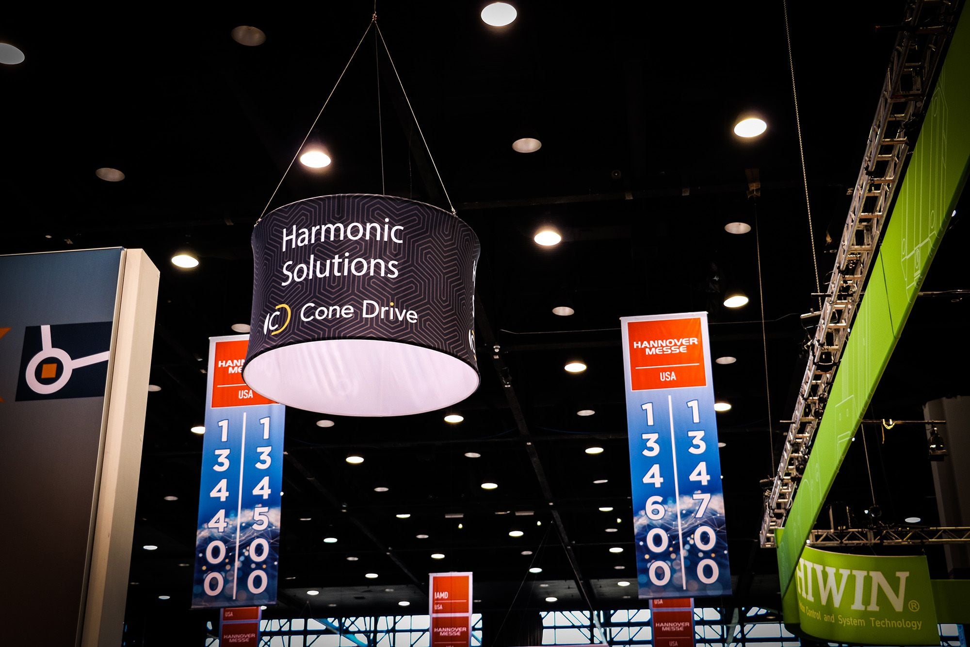 Cone Drive Harmonic Solutions banner hanging above the Hannover Messe USA trade show floor